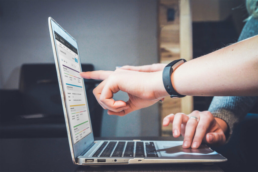 Pointing to screen photo by John Schnobrich Unsplash